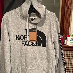 Never worn new with tags. Runs small. Fits like a medium